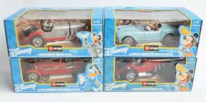 Four 1/18 scale diecast Disney themed model cars from Burago to include Mickey Mouse Lancia