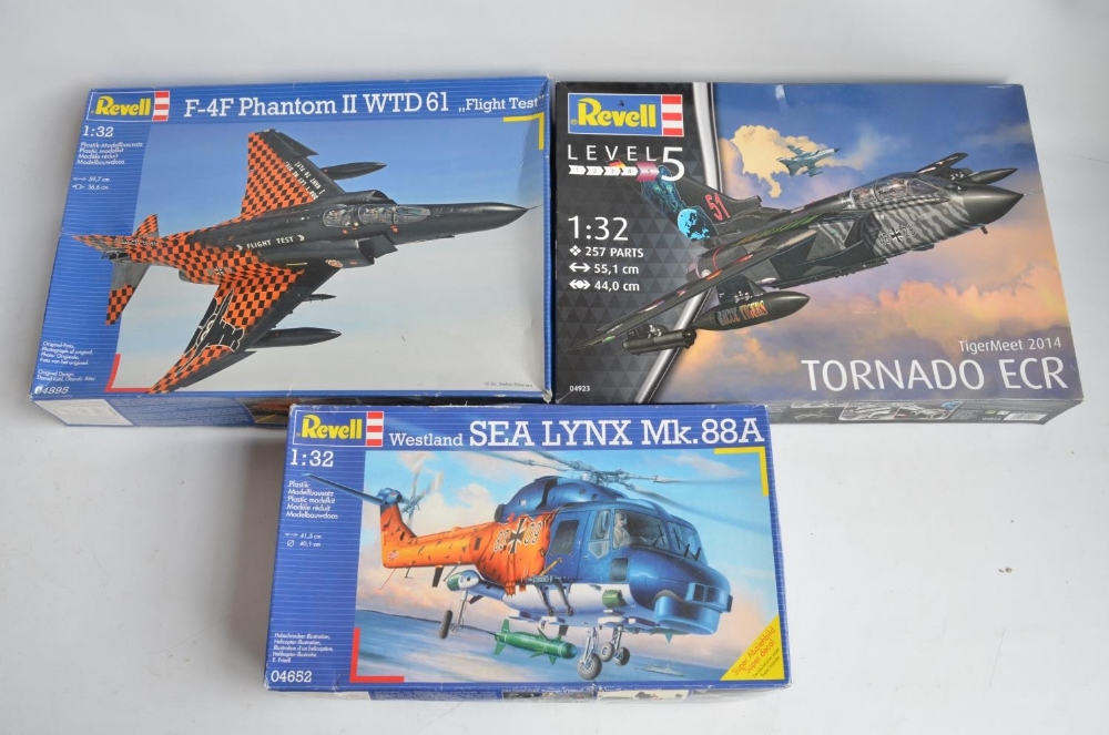 Three unbuilt 1/32 scale German Air Force and Naval jet and helicopter plastic model kits to include