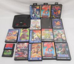 Sega Mega Drive II 16-bit console(lacking adapter or controller) 15 boxed games(4 lacking manuals)