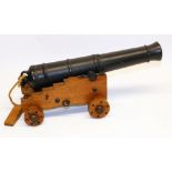 Quality scale cannon model with heavy cast metal 16" barrel mounted on oak gun carriage. (40cm