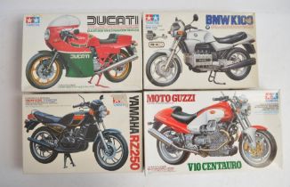 Four unbuilt 1/12 scale plastic model motorcycle kits from Tamiya to include 14069 Moto Guzzi V10