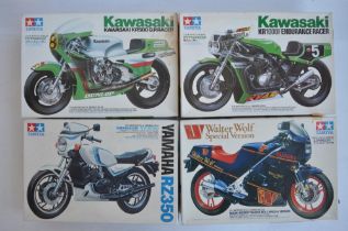 Four unbuilt 1/12 scale plastic model motorcycle kits from Tamiya to include 14012 Kawasaki