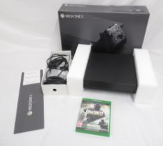 Xbox One X console with controller and original box, with Call of Duty Legacy Edition Advanced