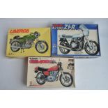 Three 1/8 scale motorcycle plastic model kits, (1 partially built up) to include Nagano Kawasaki