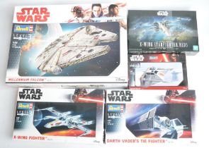 Five unbuilt Star Wars plastic model kits from Revell and Bandai, various scales to include highly
