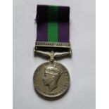 General Service Medal with Palestine 1945-48. To 7023155 Driver J.C. Coughland. Royal Signal corps.