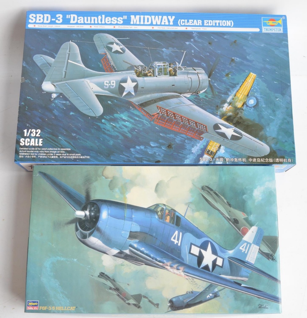 Two unbuilt 1/32 scale US Navy aircraft plastic model kits to include Hasegawa F6F-3/5 Hellcat (ST7)