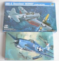 Two unbuilt 1/32 scale US Navy aircraft plastic model kits to include Hasegawa F6F-3/5 Hellcat (ST7)