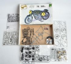 1/9 scale AJS 7R 350cc motorbike model kits from Protar (with metal parts and frame). Appears