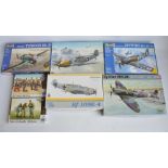 Collection of unbuilt 1/32 scale WWII era plastic model kits and figure sets to include Hobby Boss