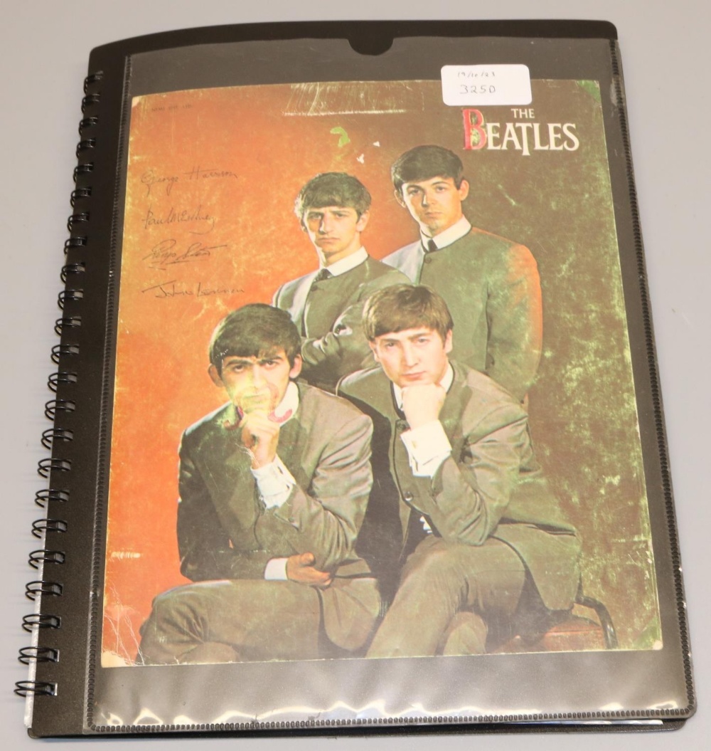 Beatles - folder cont. 14 negatives and transparencies relating to the Beatles, some framed in