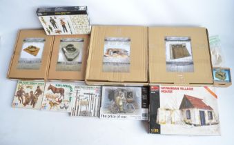 Collection of 1/35 scale WWII diorama accessories, figure sets and scenic settings to include