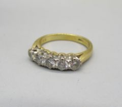 Yellow gold five stone diamond ring, the five round cut diamonds in claw setting on plain band,