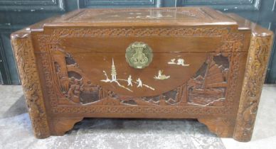 Chinese camphor lined blanket box, carved and inlaid with landscapes and figures, stepped lid with