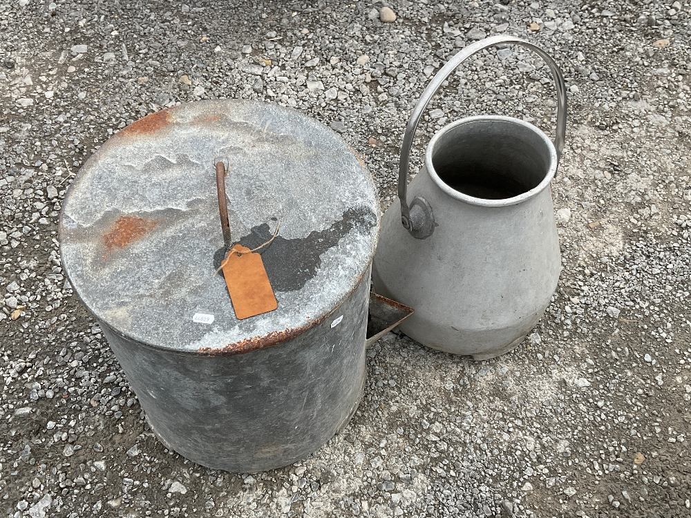 A circa 1950s poultry feeder and a vintage Gascoigne milk churn