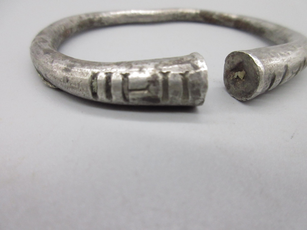 Ancient Persian silver bracelet with linear incised decoration (approx. 400BC), and another metal ( - Image 2 of 2