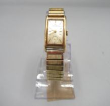 Helvetia 9ct gold wristwatch on expanding gold plated expanding bracelet, signed sunburst silvered
