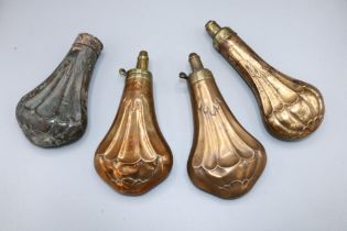 Two Dixon & Sons C19th copper and brass embossed powder flasks, 19cm and two similar