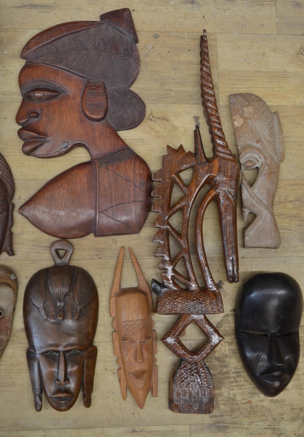 A large collection of wooden masks and carvings of various ages and styles, originating from - Image 2 of 5