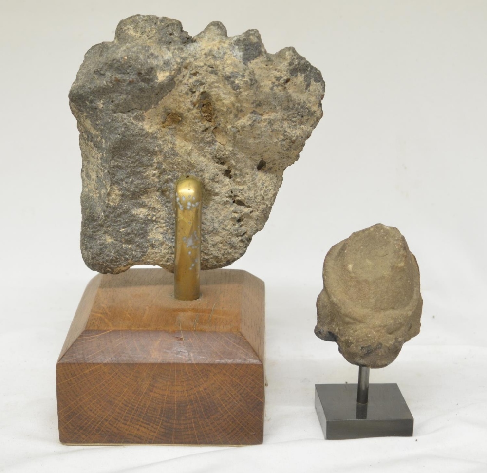 Two carved stone heads on wood and stone plinths, origins unknown, larger carving with plinth - Image 3 of 4