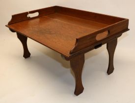 Oak lap tray with folding legs, stamped 'FAULKNERS PATENT', 55 x 28 x 38cm