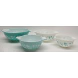 Set of four graduating JAJ Pyrex 'Cinderella' mixing bowls, gooseberry design in turquoise and