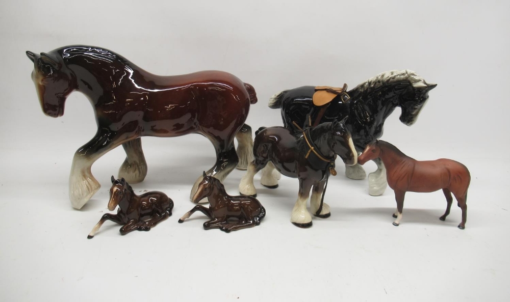 Two Beswick horses No. 915, a Royal Doulton horse and three other large ceramic shire horses (6)