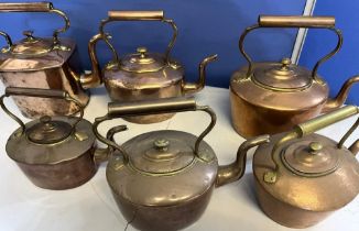 Six Victorian copper kettles with acorn & mushroom finials, H29cm