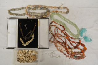 Collection of stone necklaces, to include ancient African examples and loose beads, and a small