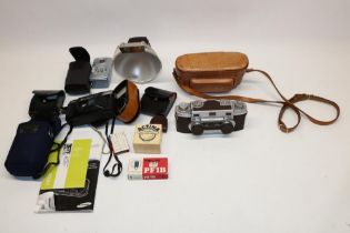 Revere Stereo 33 camera with leather case, Revere Model 24 flash gun, and other later cameras and