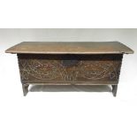 18th century oak boarded coffer, chip carved with scrolls, W96cm D36cm H46cm (Victor Brox