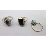 14ct yellow gold ring set with black stone, stamped 585, size K1/2, a 9ct white gold ring set with