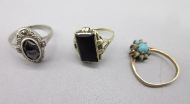 14ct yellow gold ring set with black stone, stamped 585, size K1/2, a 9ct white gold ring set with