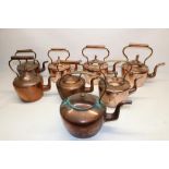 Eight Victorian copper kettles all with acorn & mushroom finials, H32cm (2)