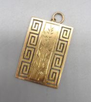 9ct yellow gold pendant with Greek key border and Chinese characters, stamped 375, 5.3g