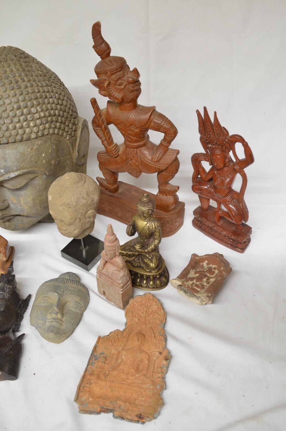 Collection of mostly eastern stone and wood figure carvings to include Buddha, Thai temple guard, - Image 2 of 6