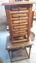 Small oak chest of five drawers, oak occasional table with carved detail and an oak wine table
