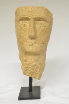 Ancient carved stone head, origin unknown, H30.5cm incl. stand (Victor Brox collection)