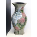 Moorcroft Pottery, Isola Bella pattern vase decorated with chrysanthemums and white peacocks,
