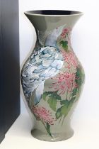 Moorcroft Pottery, Isola Bella pattern vase decorated with chrysanthemums and white peacocks,