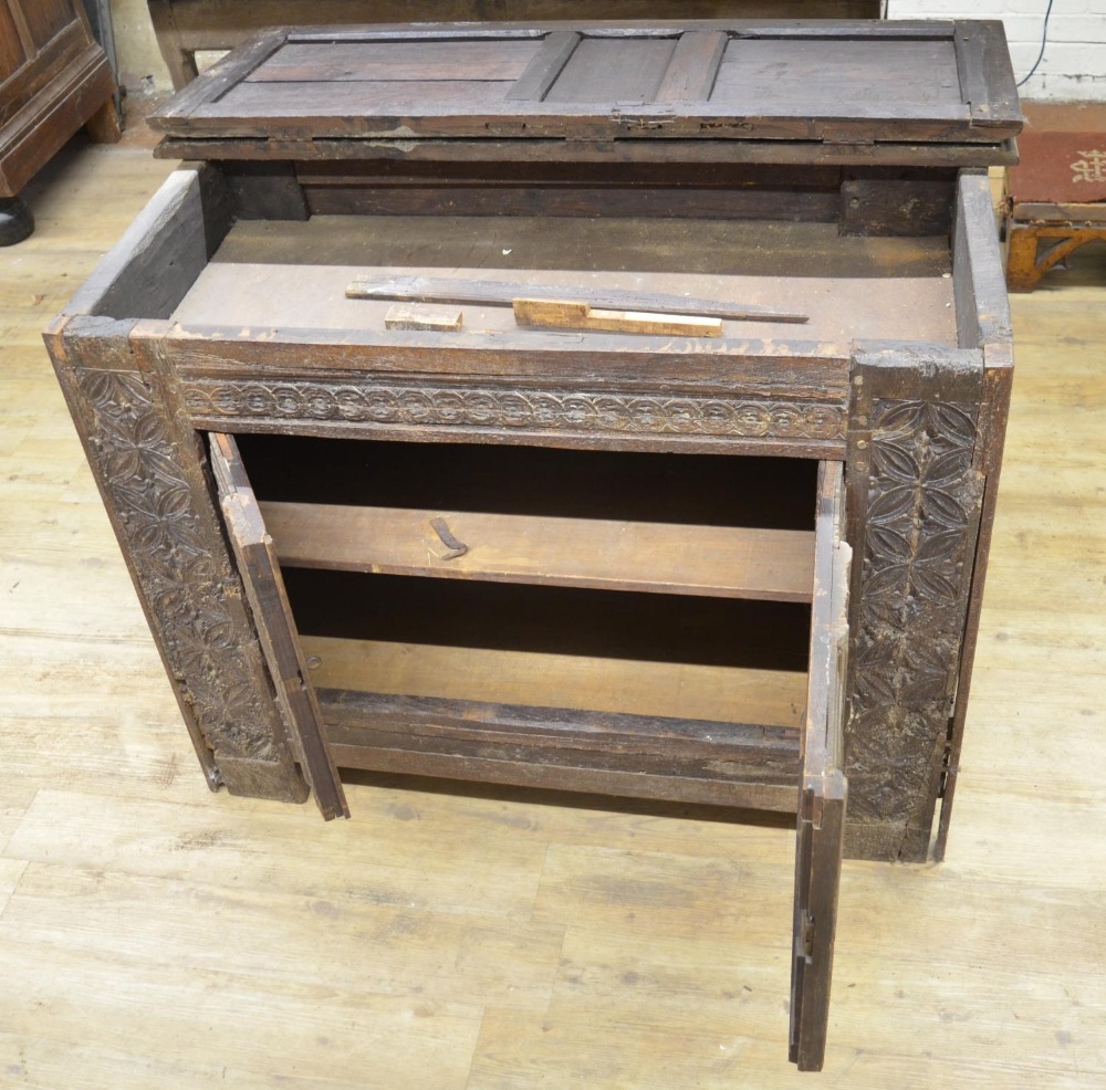 18th century French oak side cabinet, hinged top above two doors carved with strapwork, W129cm D63cm - Image 5 of 6