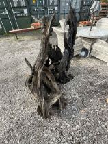 A quantity of weathered wood for use as a garden feature