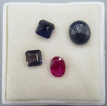 Oval cut unmounted sapphire, approx. weight 1.0 carat, an unmounted ruby, approx. weight 0.65 carat,