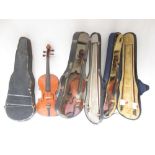Three unnamed violins, 2 with 2 bows in travel cases and another lacking bow in travel box (Victor
