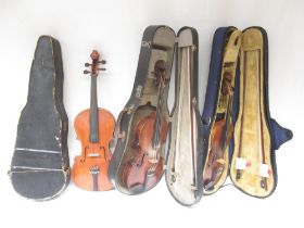 Three unnamed violins, 2 with 2 bows in travel cases and another lacking bow in travel box (Victor