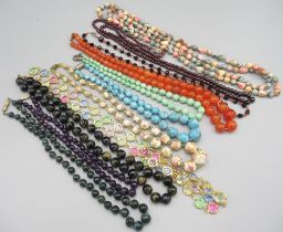 Collection of beaded necklaces incl, two jade beaded necklaces, amethyst necklace, other crystal