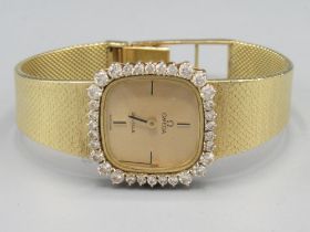 Ladies Omega De Ville gold and diamond set wristwatch on integrated fine mesh tapering bracelet