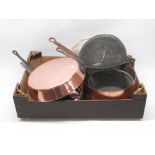 19th century copper frying pan with riveted iron handle, D29cm; two smaller frying pans and lidded