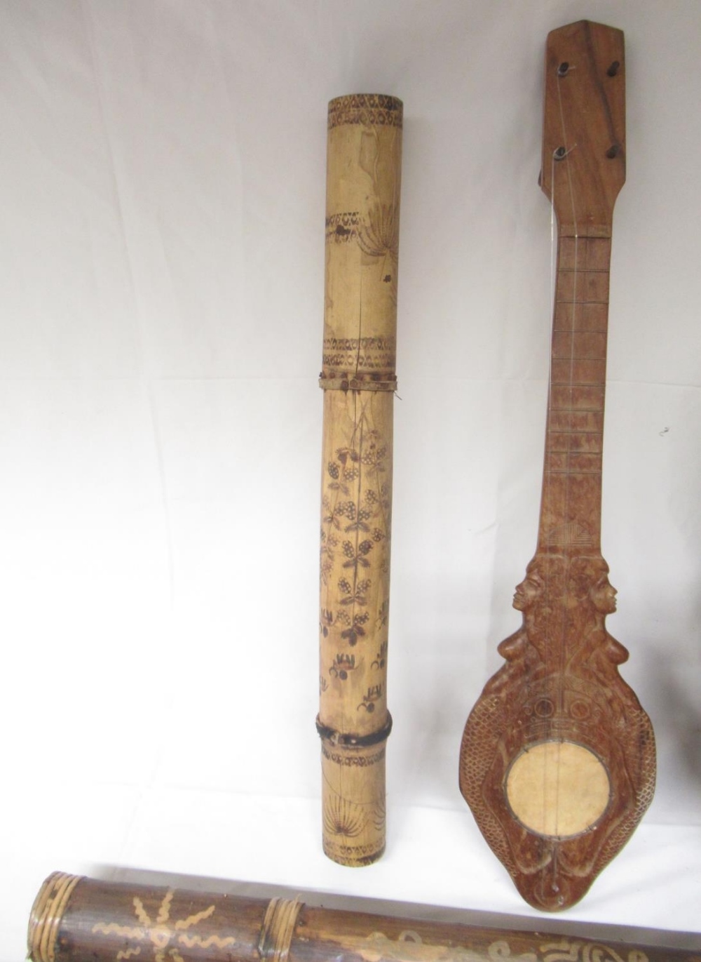 Carved didgeridoo with images of Kangaroo, Snakes, etc. carved wood 4-string instrument lacking 2 - Image 5 of 14