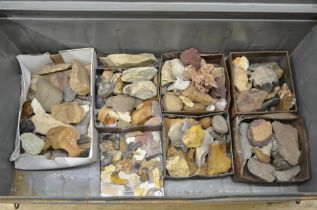 Large metal trunk containing a collection of ancient flint and stone tools and minerals (Victor Brox